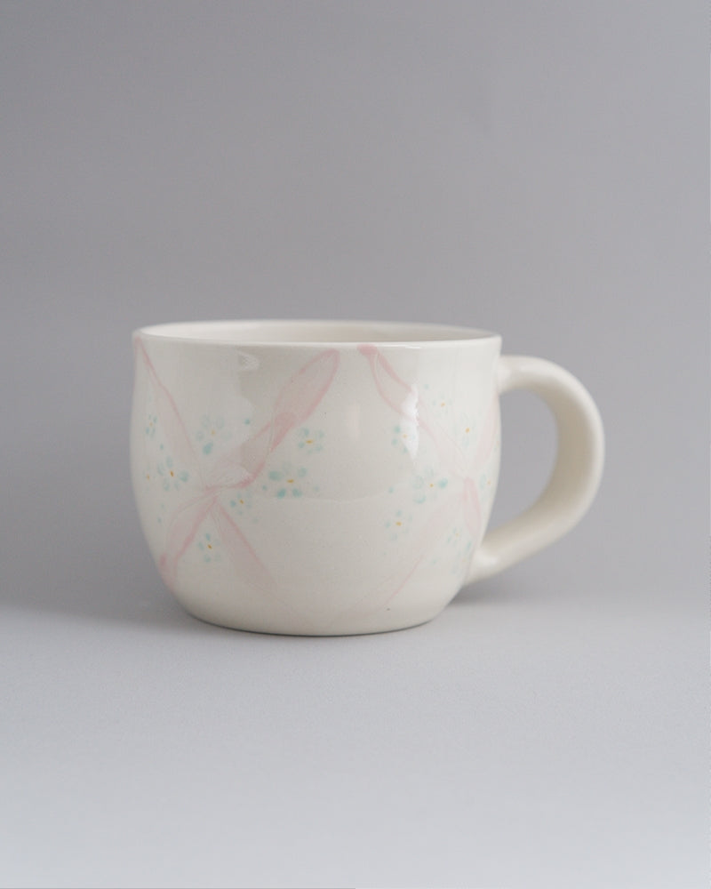 Primavera - Pink ribbon mugs with small teal/blue flowers
